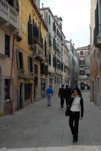 Communication by Cell Phone is indispensible now / Venetian Girl on Cell Phone(c) 2007 Ted Grellner