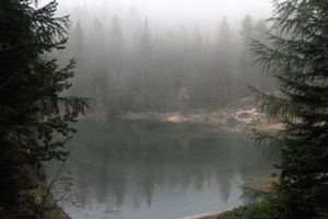 Camping in a wilderness area can reward you with scenes similar to this one on a small lake. / The Natural Beauty of the Dolomite Mtn Region - (c)2007 Ted Grellner Camping Resources / The Natural Beauty of the Dolomite Mtn Region - (c)2007 Ted Grellner